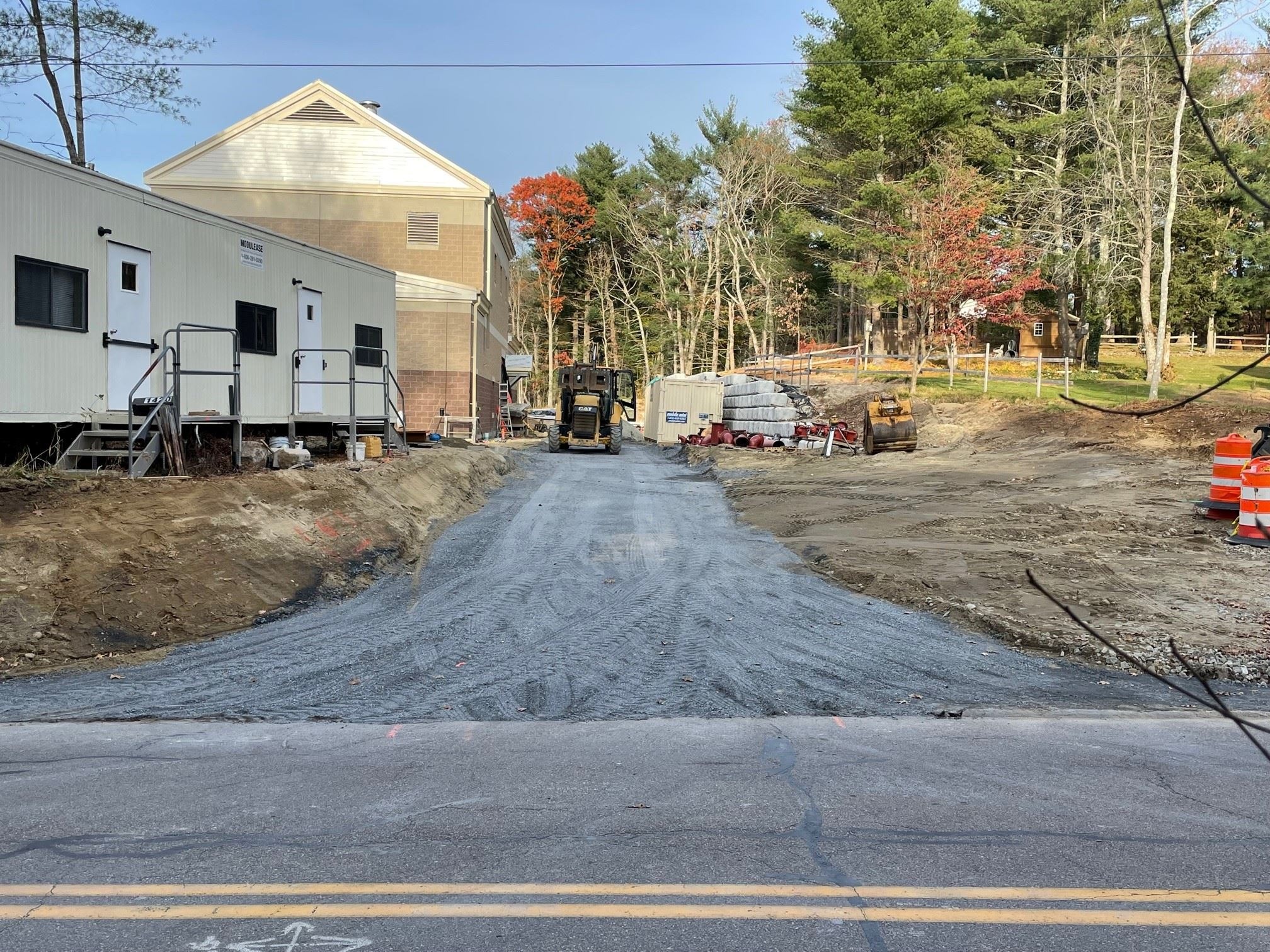 Placement of in Processed Gravel Sub-Grade of Base Pavement at the Main Entrance and Service Road